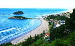 This is an Aerial view photo of the main beach at Mount Manuganui 